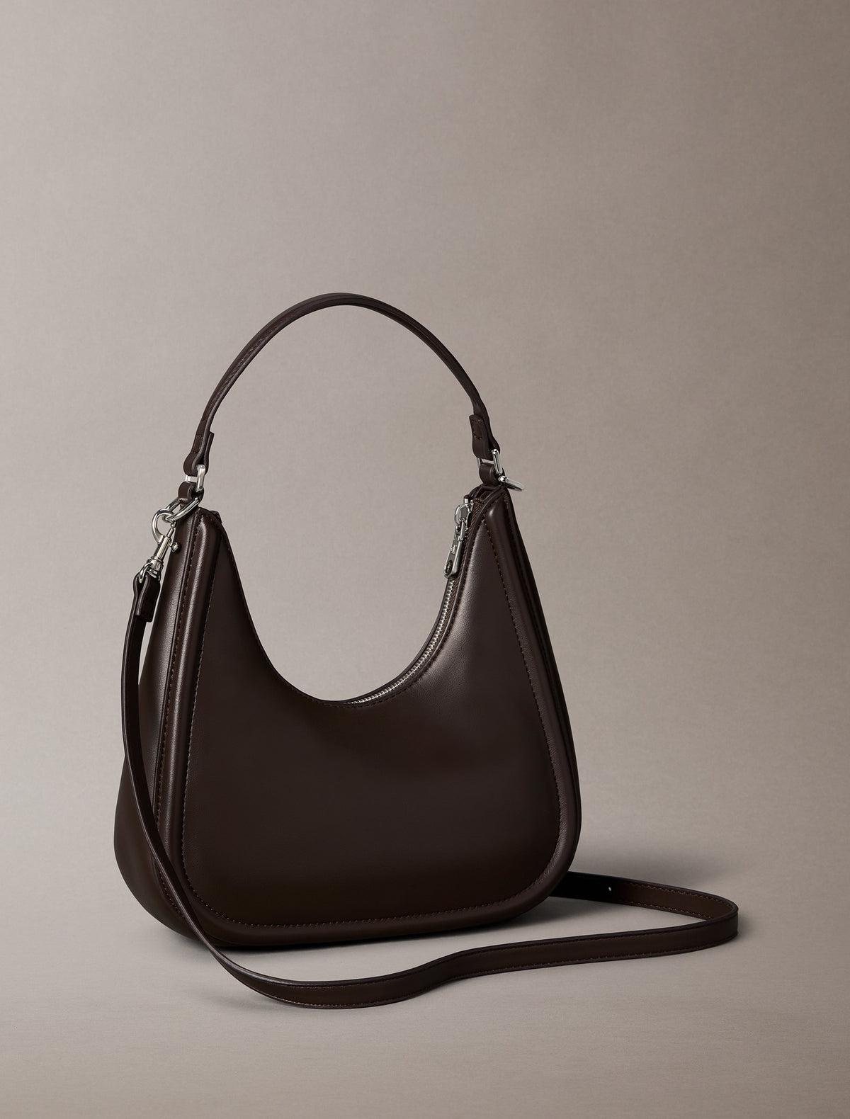 Embossed Monogram Crescent Bag