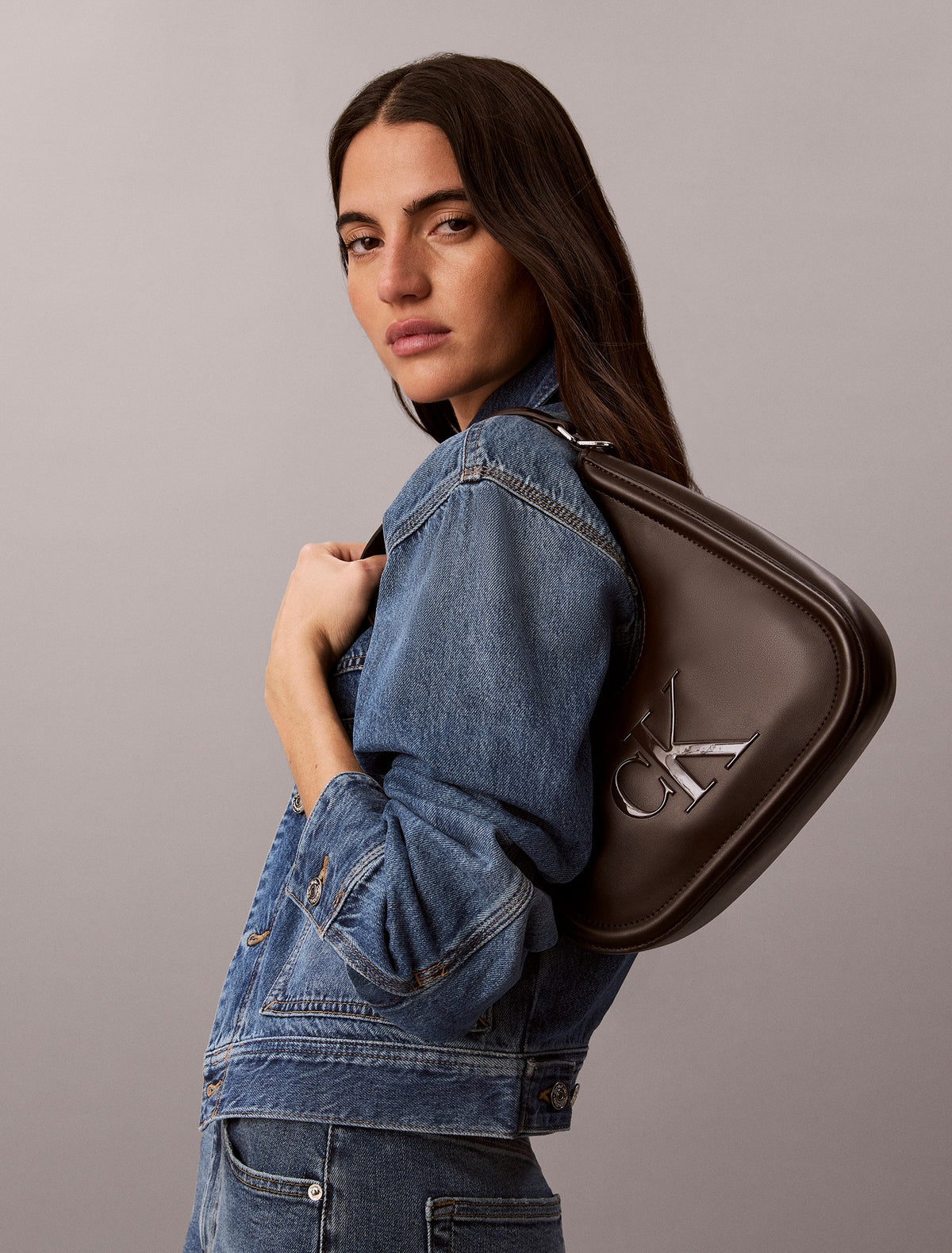 Embossed Monogram Crescent Bag