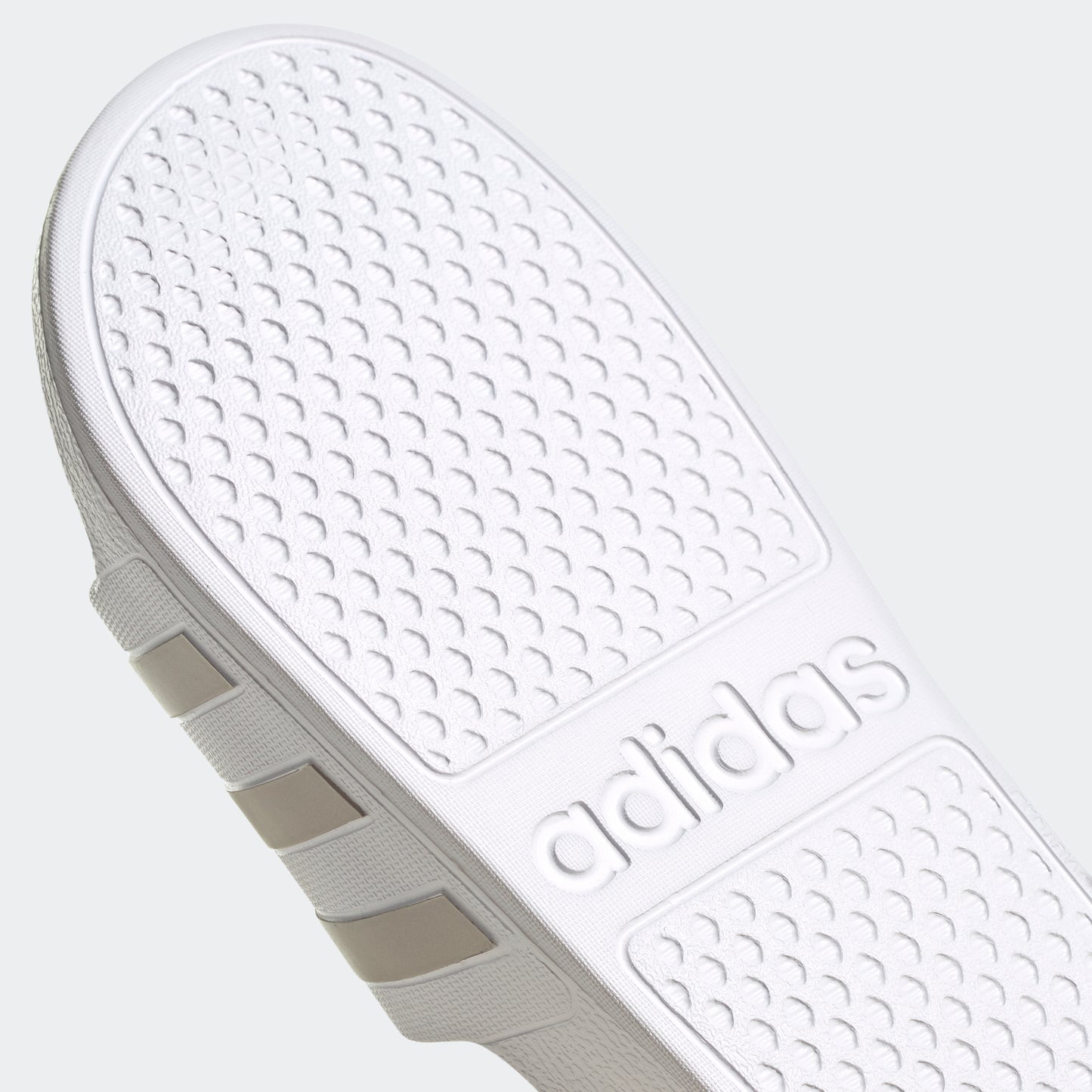 Adilette Aqua Slides (White / Platinum Metallic)