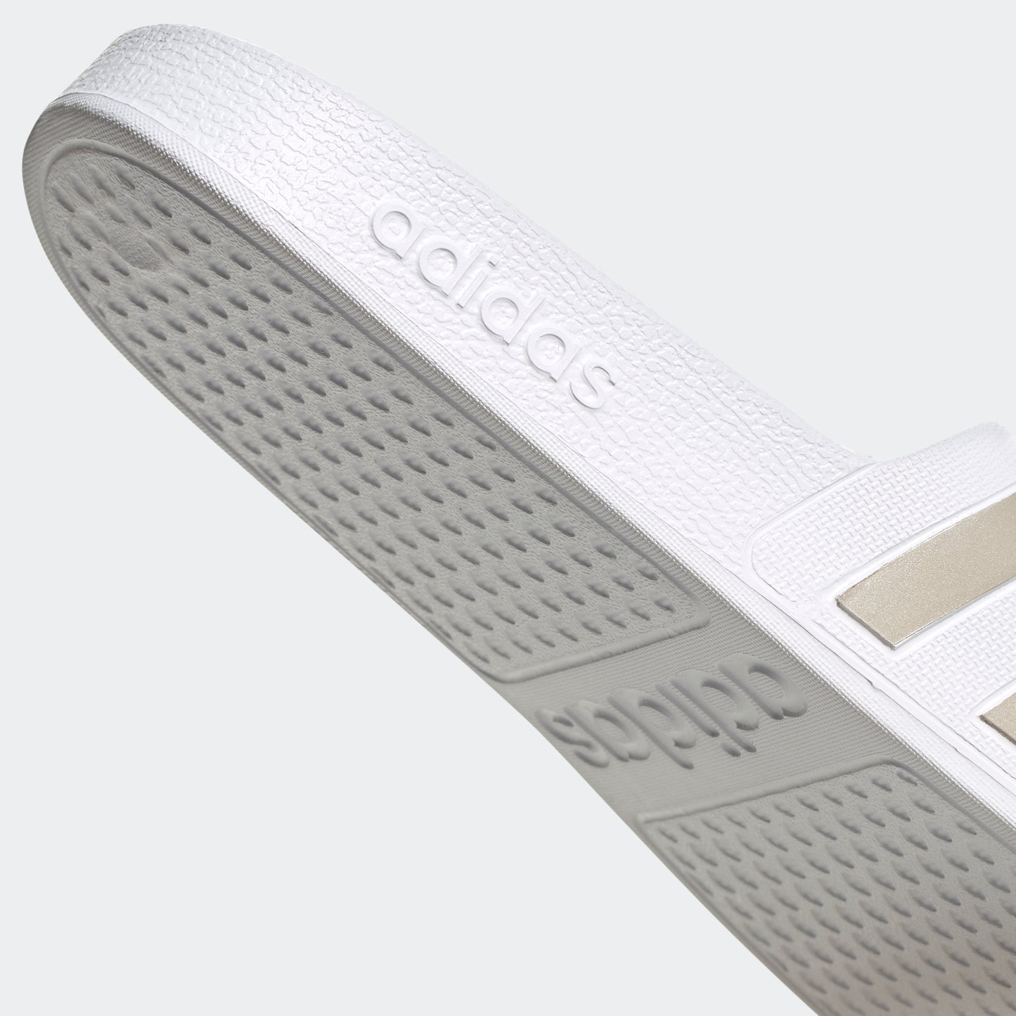 Adilette Aqua Slides (White / Platinum Metallic)